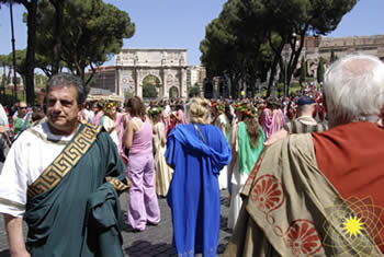 Ancient Roman Cultural dress up in front of the Arch of Constantine