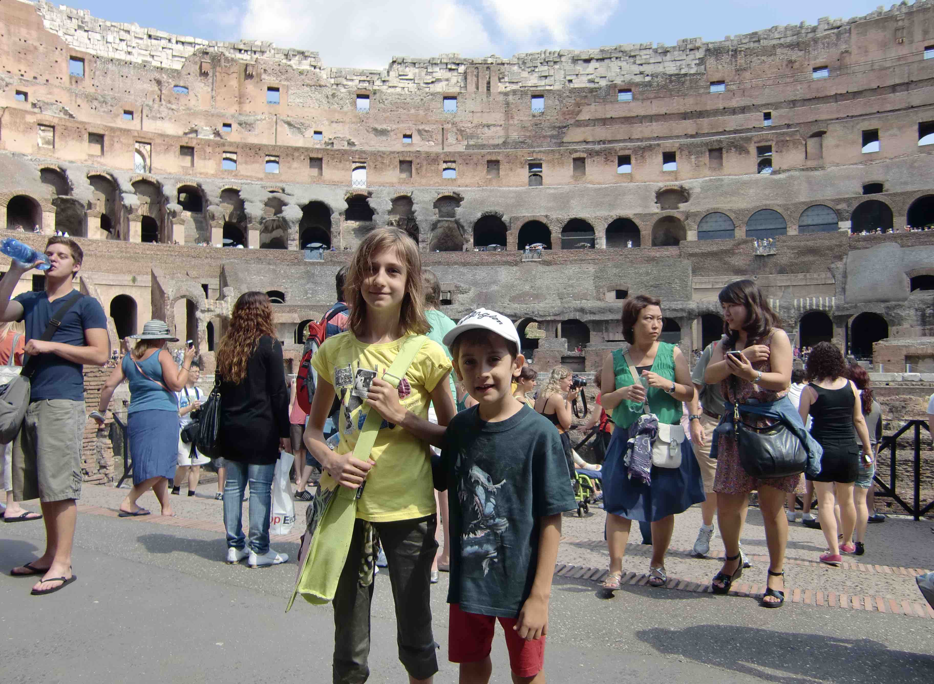 Rome Day Tours image of two happy kids while touring through the Colosseum