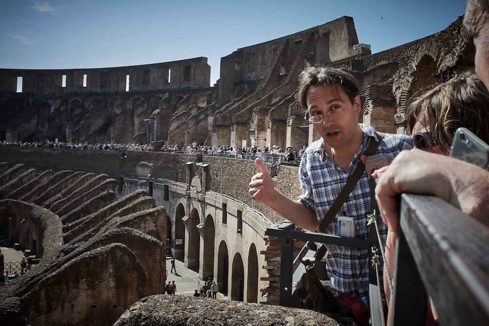 Rome Day Tours offer high quality walking tours in Rome and the Vatican, such as in this image of American Rich Brunn touring for a small family while in the Colosseum