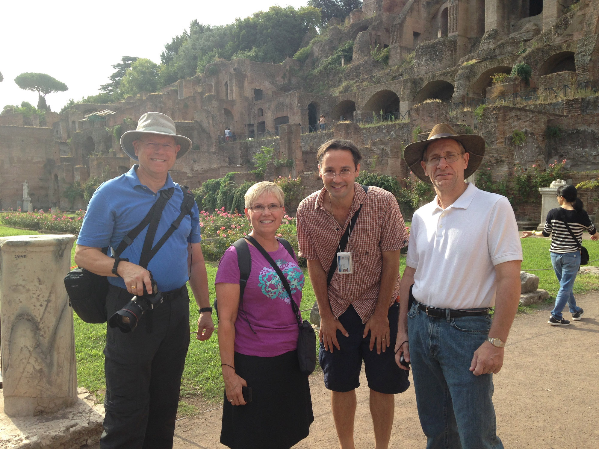 Rome Day Tours organize high quality walking tours with little to no wait in any line into places such as the Colosseuml. This is an image of Licensed Guide and American Rich Brunn leading a tour through the Imperial Forum, nearby the Colosseum